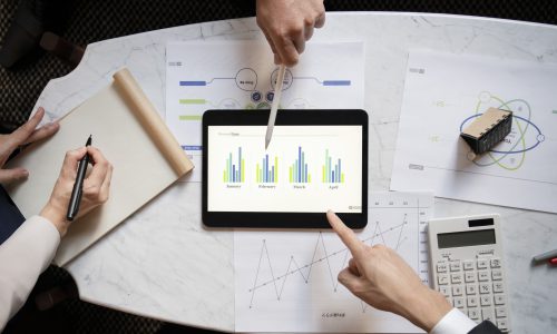 top-view-business-people-working-with-ipad